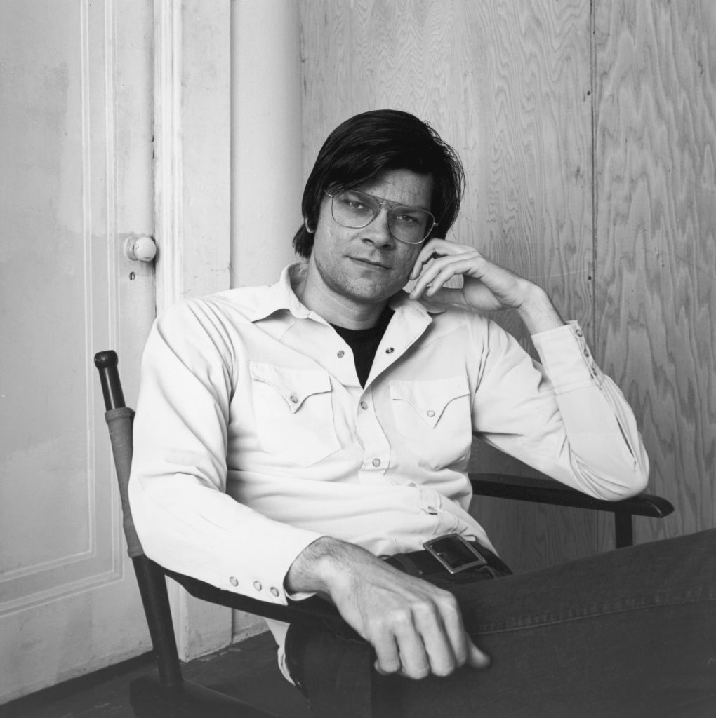 7th November 1969:  American sculptor and artist Robert Smithson (1938-1973) sitting in a director's chair.  (Photo by Jack Robinson/Hulton Archive/Getty Images)