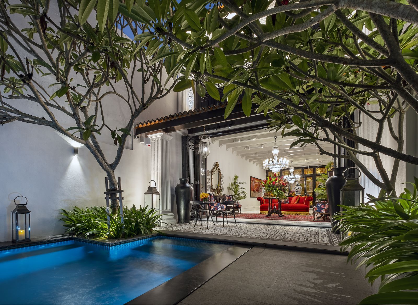 The inviting pool is located in the back of the house