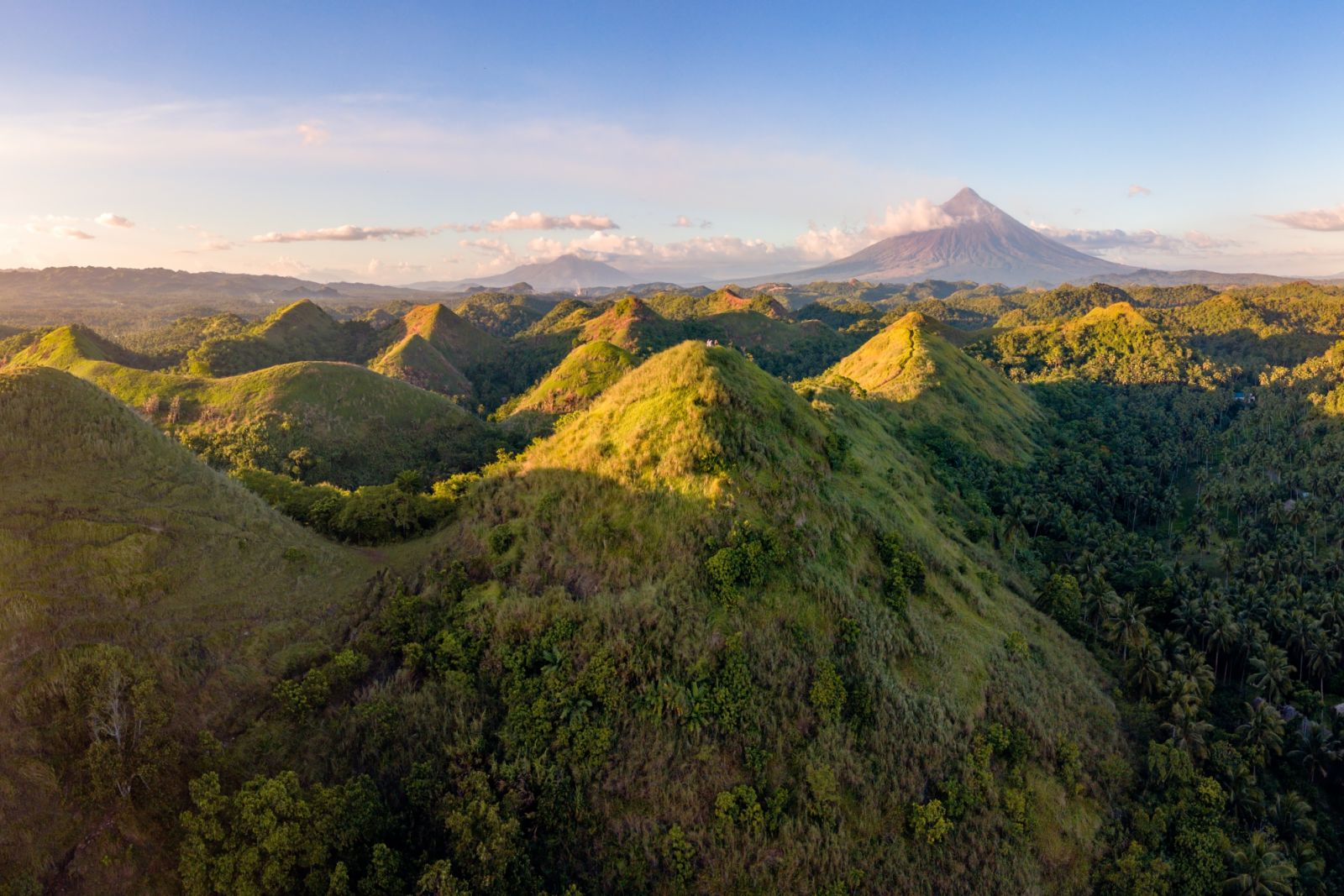 Rolling hills and Mt. Mayon, Albay, (Photo: Matteo Colombo/GettyImages)