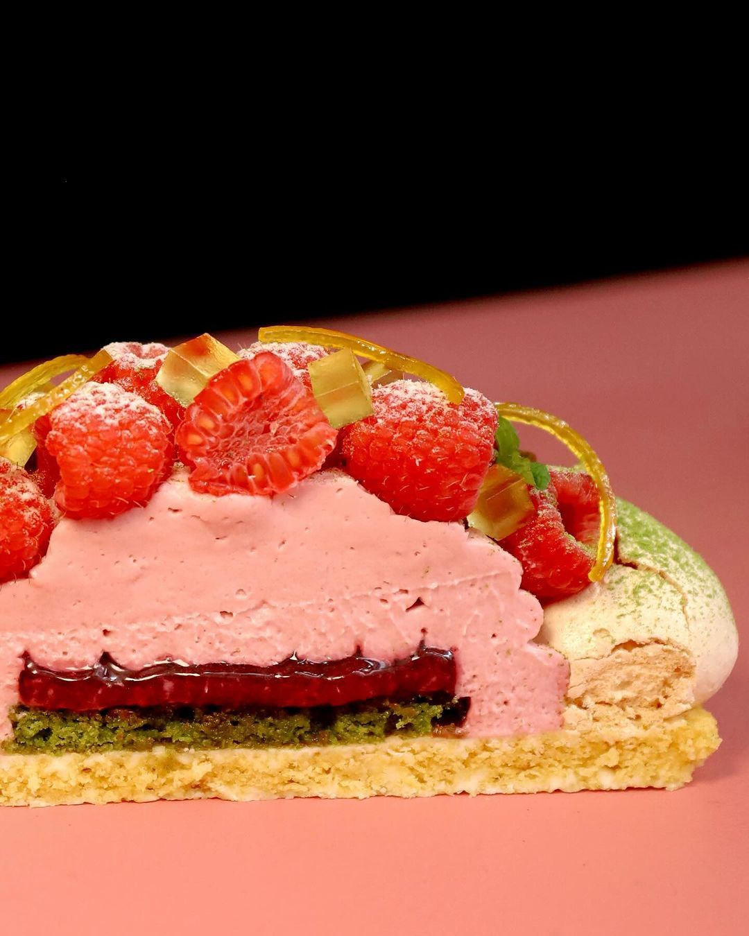 The dessert spot’s raspberry pavlova is filled with rose jam and pandan sponge (Photo: Instagram / @keepitsofte)