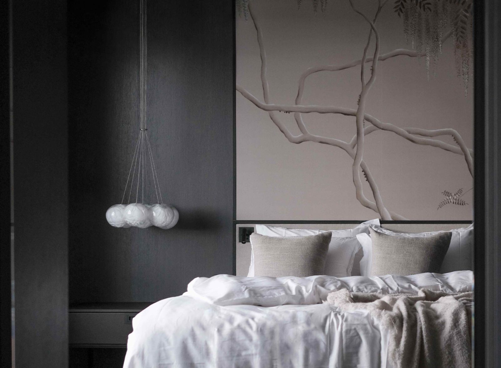 The Japanese-infused bedroom beckons