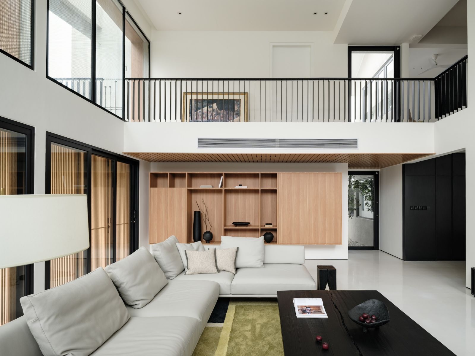 A balcony overlooks the living