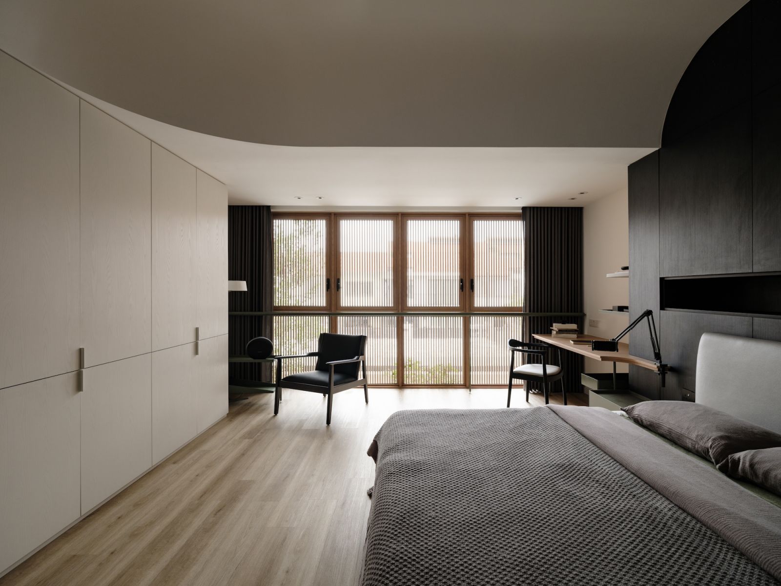 Beautiful light filters into the master bedroom