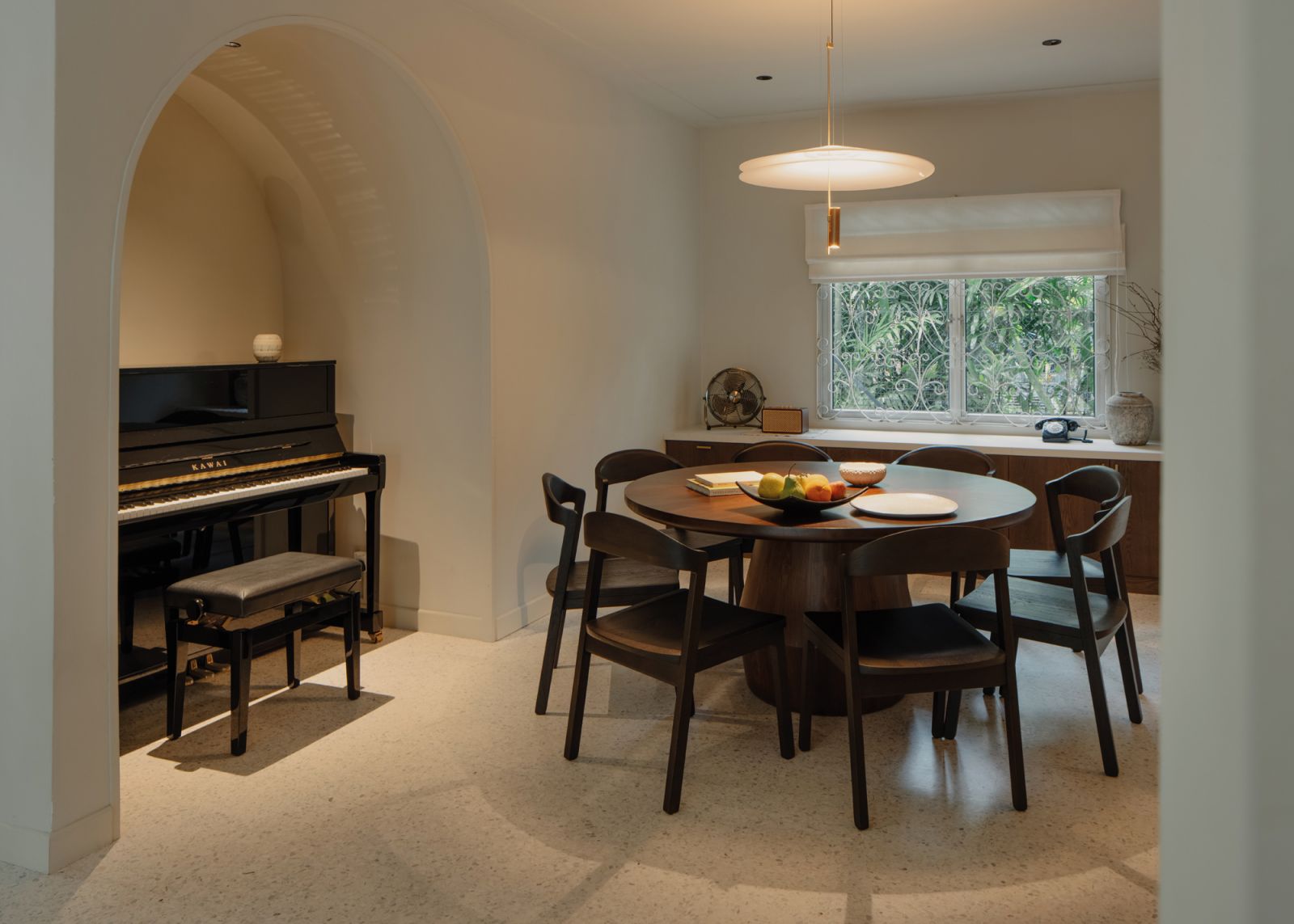 The dining area feels intimate and cosy, with family meals lending themselves to musical accompaniment