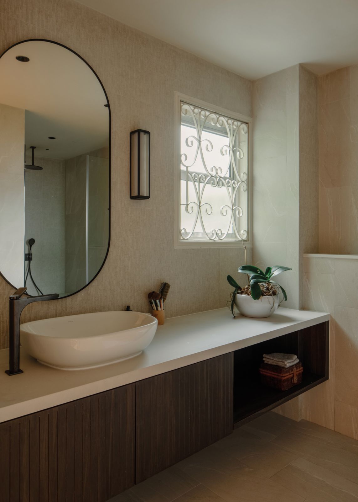 This bathroom features a harmonious mix of heritage and more modern fixtures