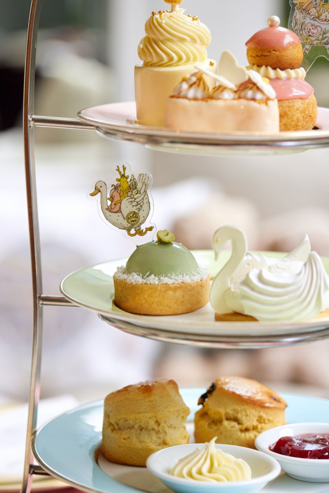 A tower of sweets decorated with Atelier Choux’s iconography