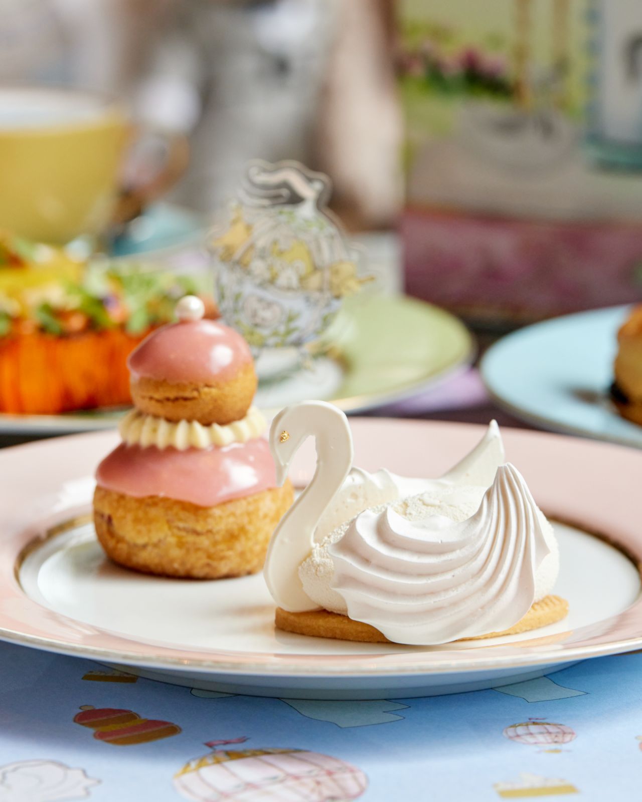 Swan-shaped white chocolate mouse and strawberry religieuse