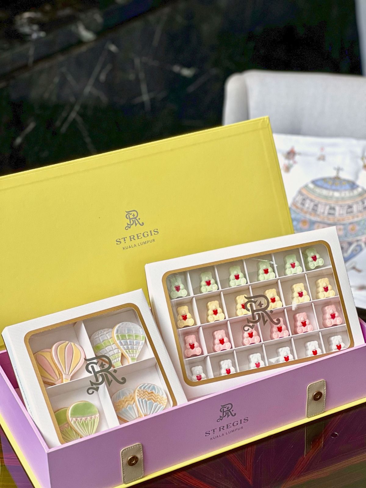 Vanilla hot air balloon cookies and teddy bear-shaped chocolate bon bons