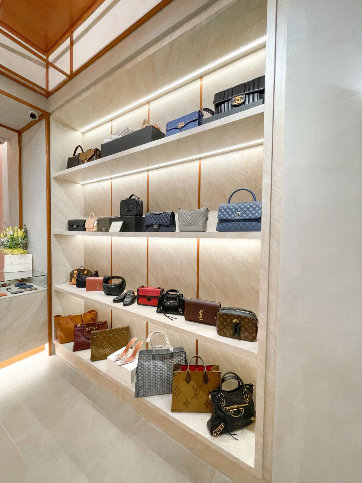 A wall of  carefully selected and authenticated shoes and bags (Photo: Courtesy of The Bag Hub)