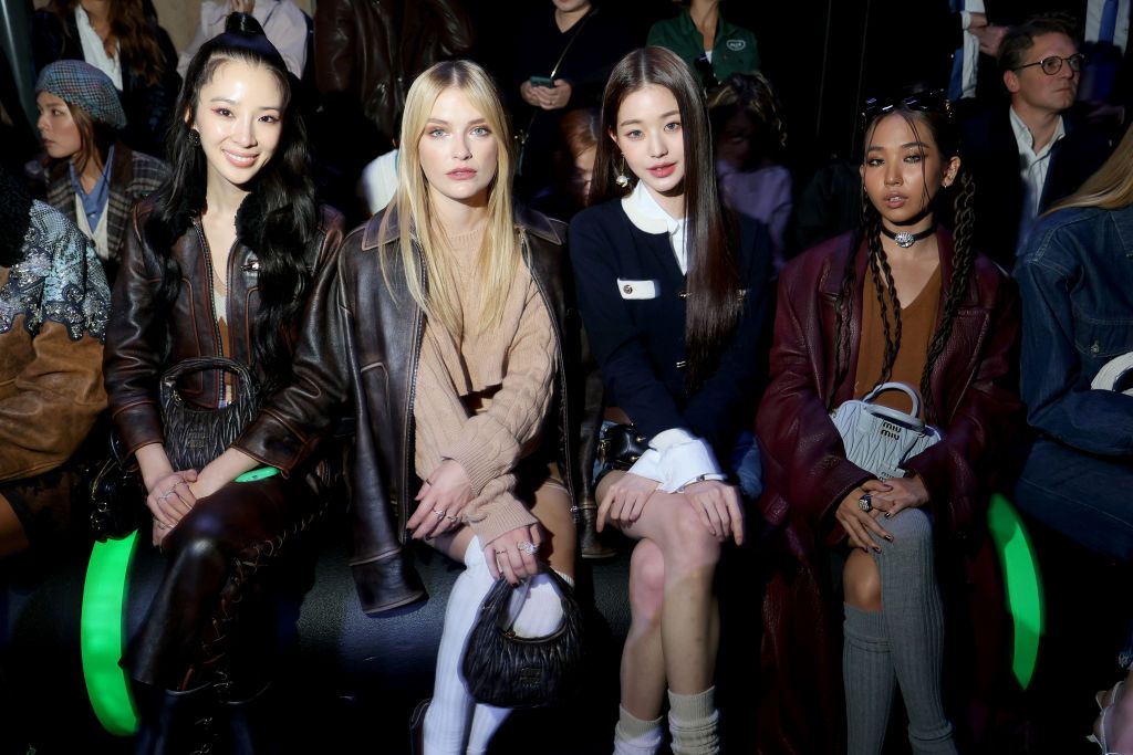 PARIS, FRANCE - OCTOBER 04: (L-R) Irene Kim, Camille Razat, Won-young Jang and Milli attend the Miu Miu Womenswear S/S 2023 show as part of Paris Fashion Week at Palais d'Iena on October 04, 2022 in Paris, France. (Photo by Victor Boyko/Getty Images for Miu Miu)