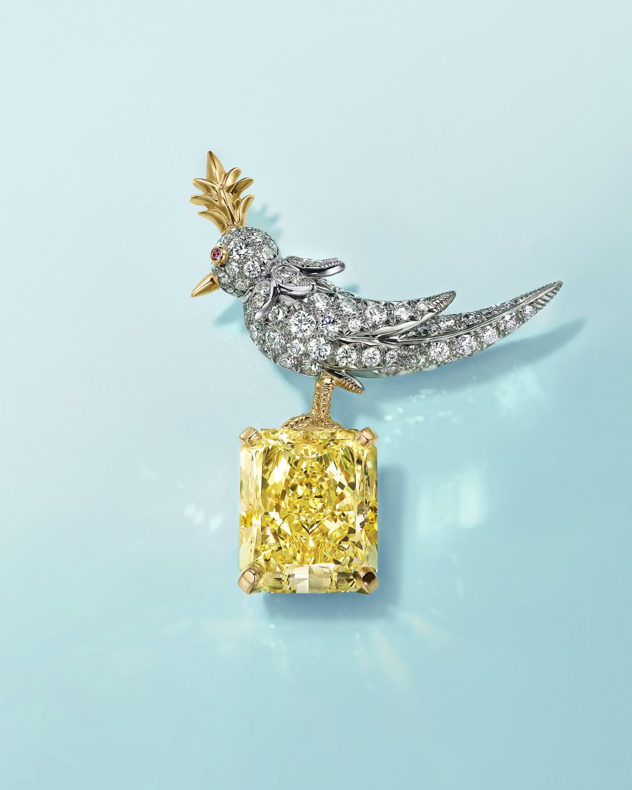 Jean Schlumberger by Tiffany & Co 'Bird on a Rock' brooch in platinum and 18c yellow gold with a Fancy Intense Yellow diamond, white diamonds, and a pink sapphire (Photo: Courtesy of Tiffany & Co)