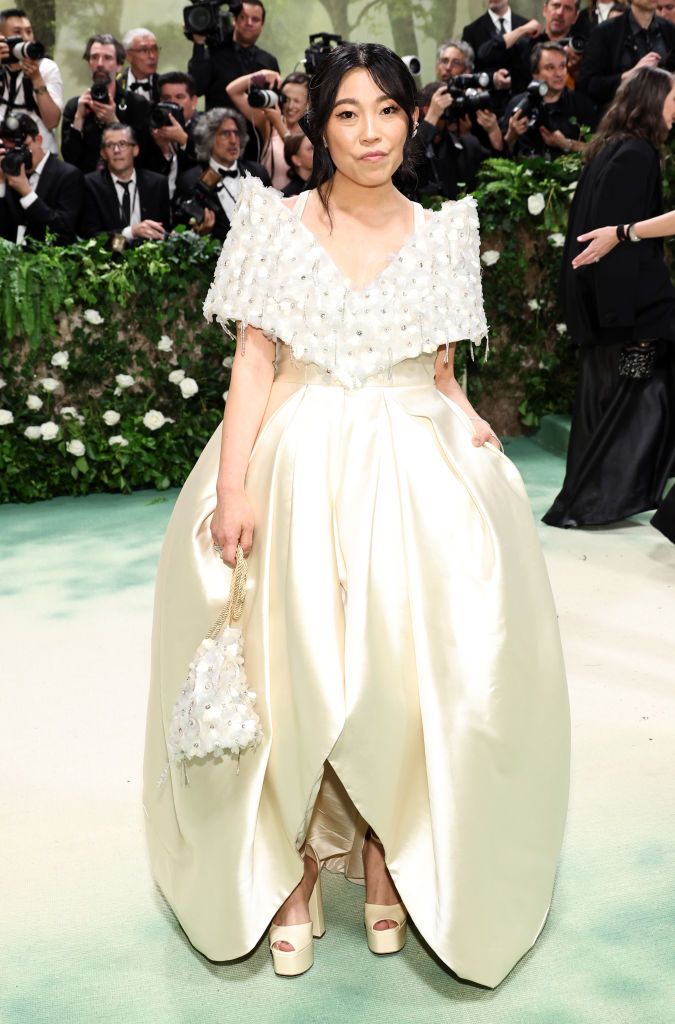 NEW YORK, NEW YORK - MAY 06: Awkwafina attends The 2024 Met Gala Celebrating "Sleeping Beauties: Reawakening Fashion" at The Metropolitan Museum of Art on May 06, 2024 in New York City. (Photo by Jamie McCarthy/Getty Images)