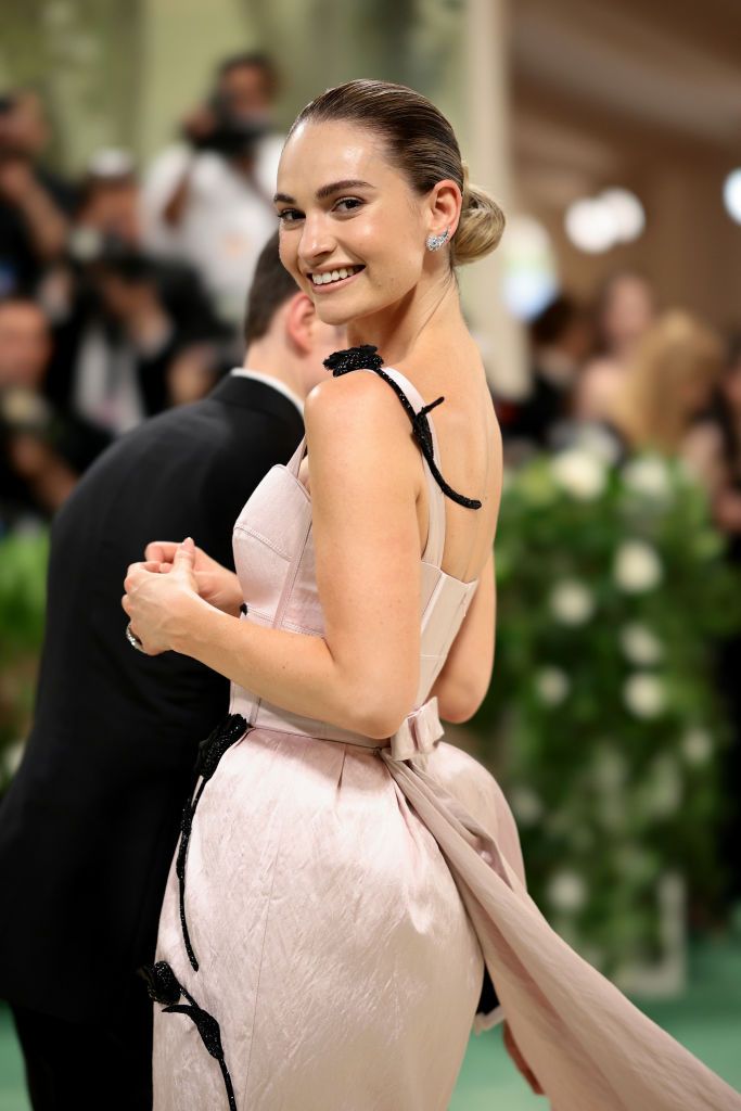 NEW YORK, NEW YORK - MAY 06: Lily Jamesattends The 2024 Met Gala Celebrating "Sleeping Beauties: Reawakening Fashion" at The Metropolitan Museum of Art on May 06, 2024 in New York City. (Photo by Dimitrios Kambouris/Getty Images for The Met Museum/Vogue)