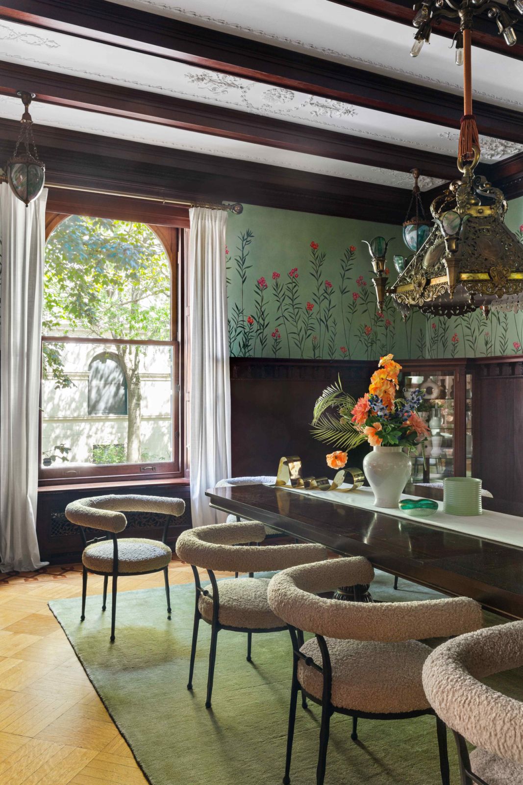 Soft green notes against antique and contemporary furnishings