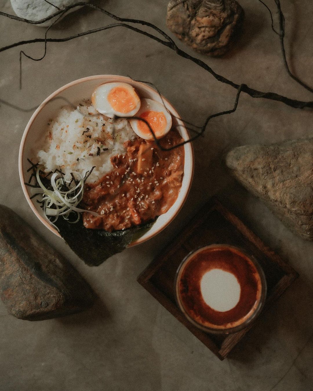 A kimchi rice bowl with braised minced pork and a ramen egg (Photo: Instagram / @nost.kl)