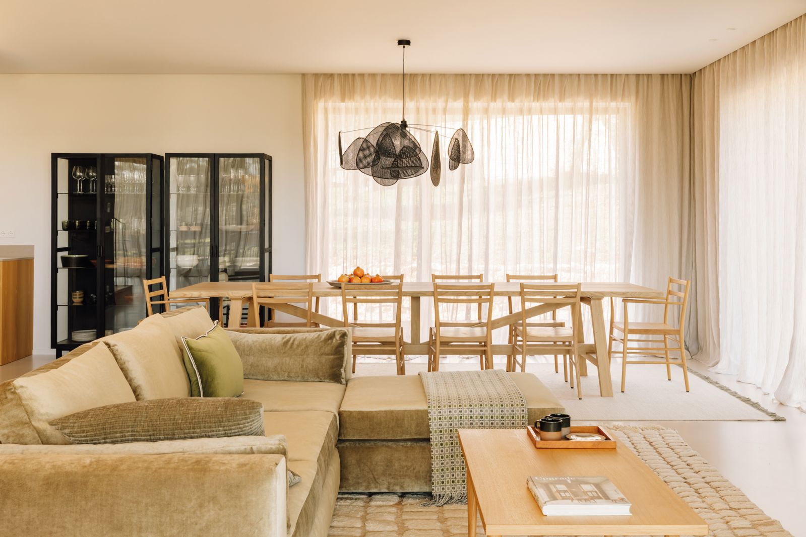 A Heerenhuis table and chairs from Pinch Design set the tone for the dining space, presided over by a Market Set hanging lamp