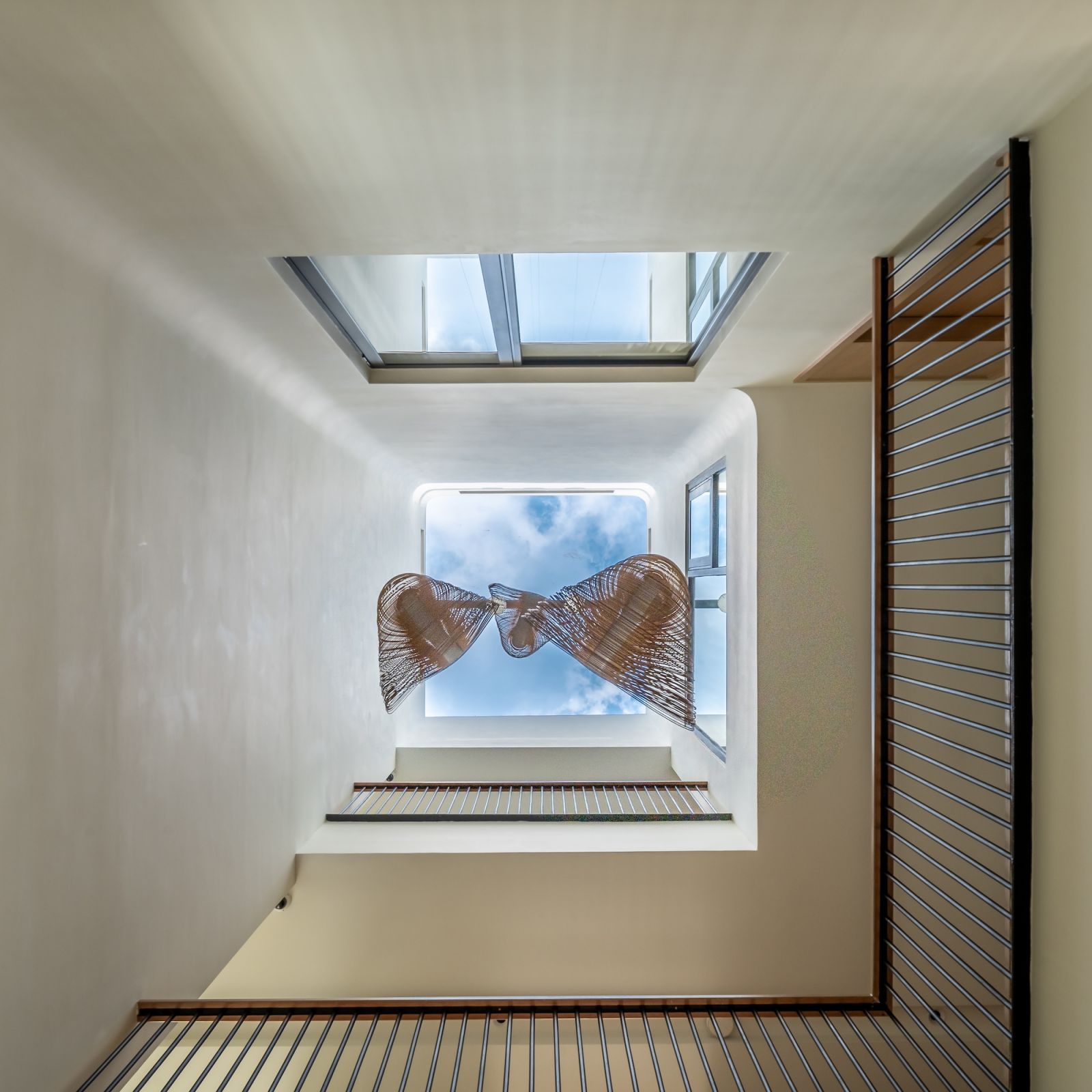 Volumetric play within the 3 storey home ensures that family members remain in constant visual and audial contact