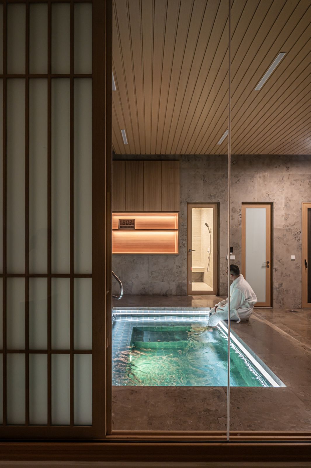 A Japanese-style family onsen is incorporated into the first floor of the house and is used as a family activity regularly