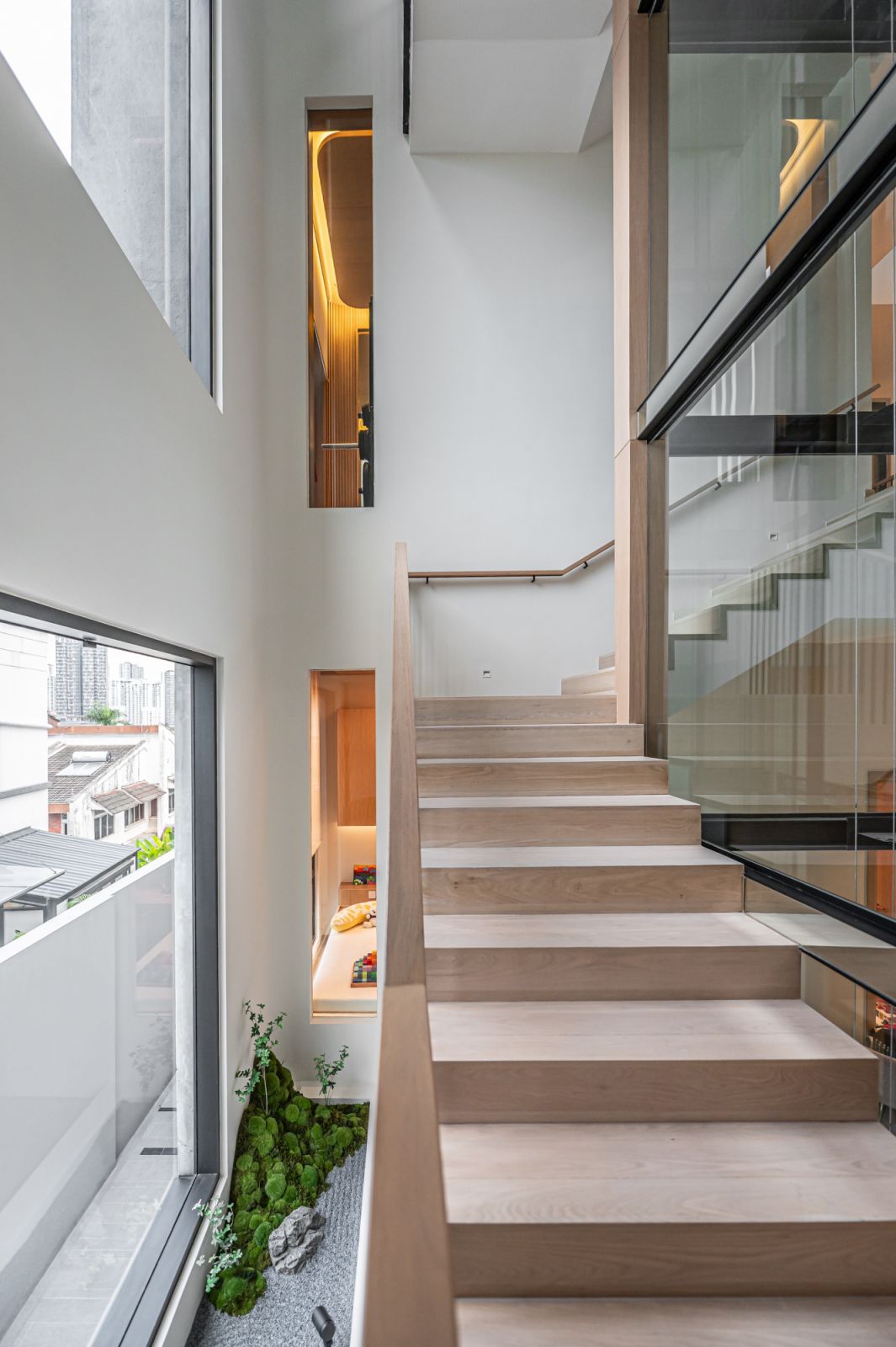 Volumetric play within the 3 storey home ensures that family members remain in constant visual and audial contact