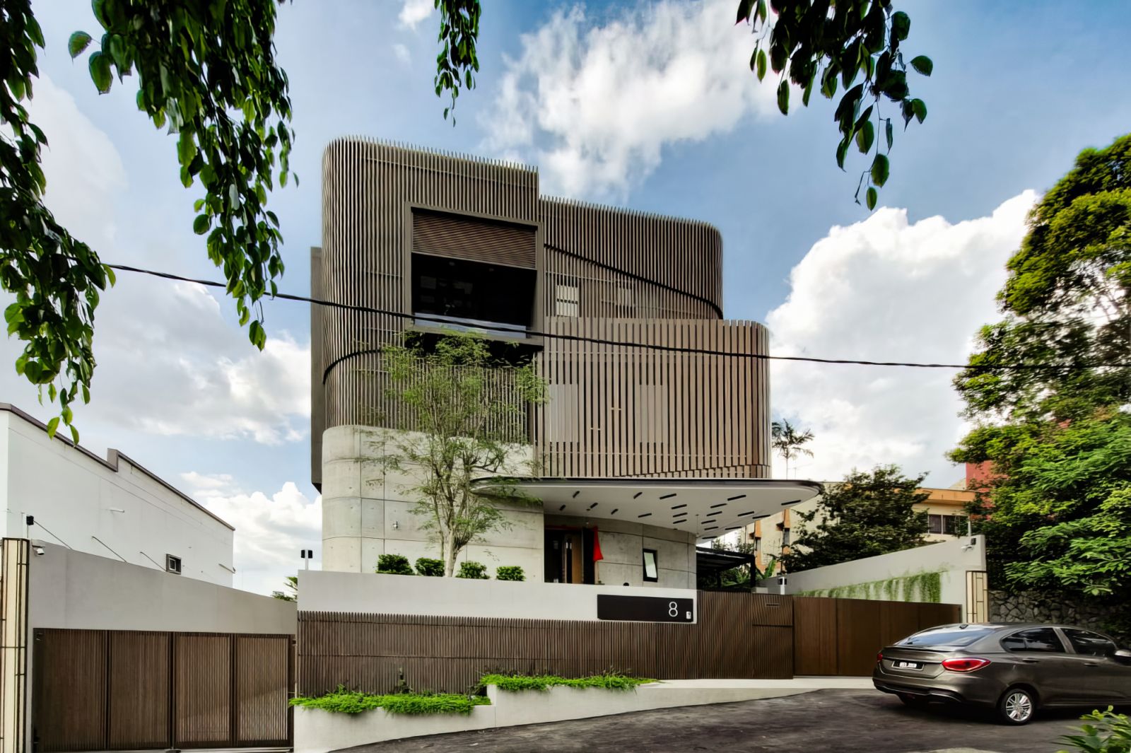 The design takes on the sincerity of Japanese architecture with material expressed in natural hues and textures