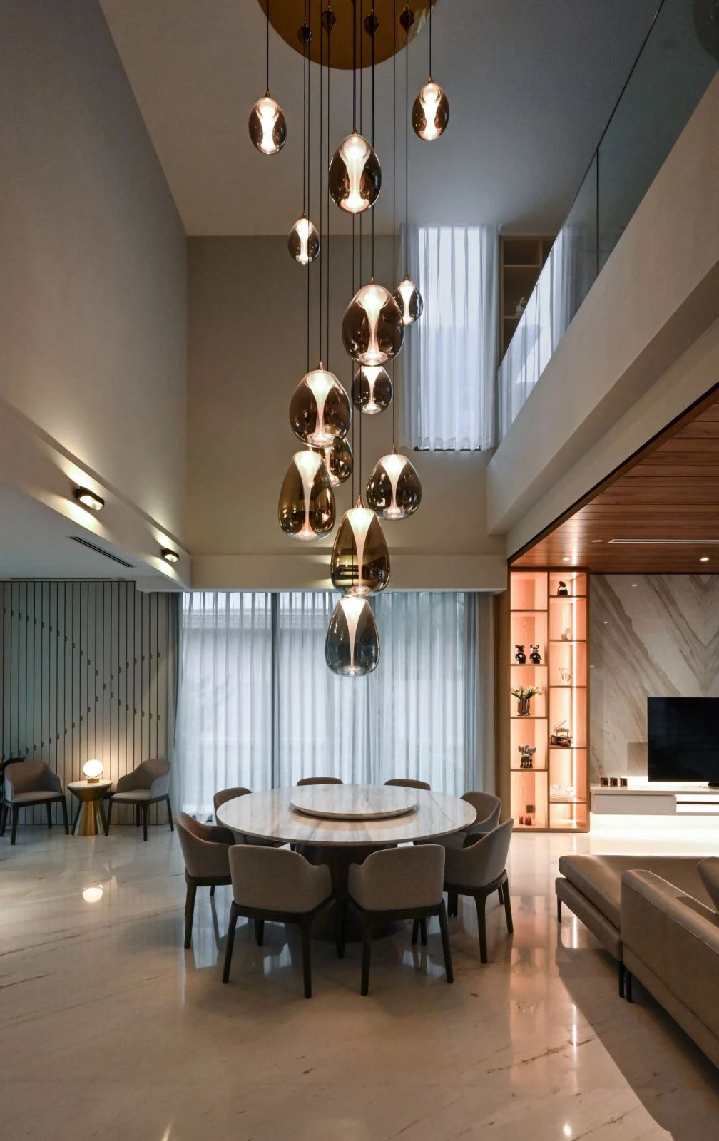 The bespoke pendant with metallic nano-coating in the dining area (Photo: Gavin Yam)