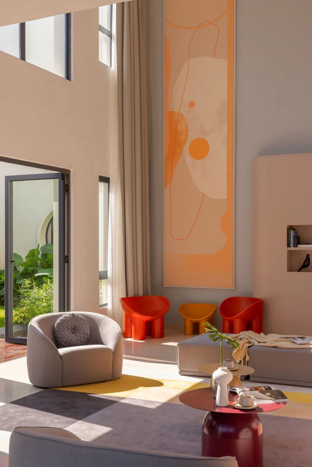 Neutral and pastel-coloured, low-slung furnishings in the spacious areas (Photo: Lawrence Choo)