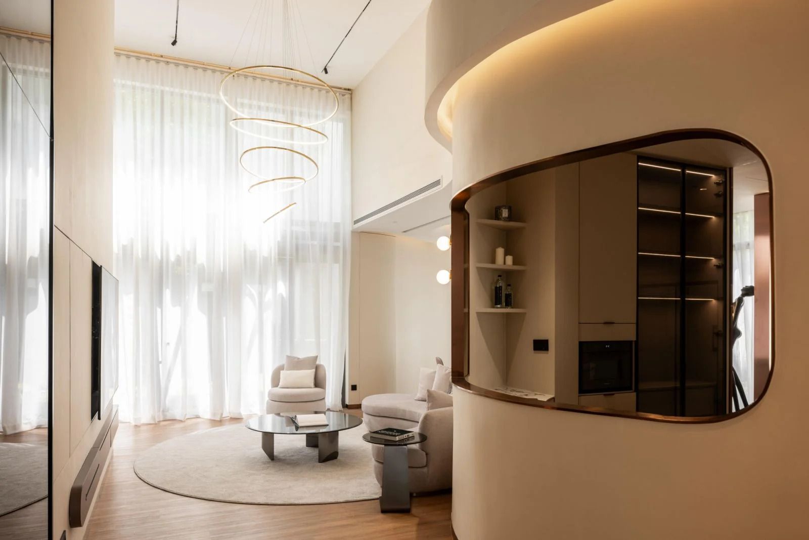 The curved walls in the double-volume atrium (Photo: Pixelaw Photography)