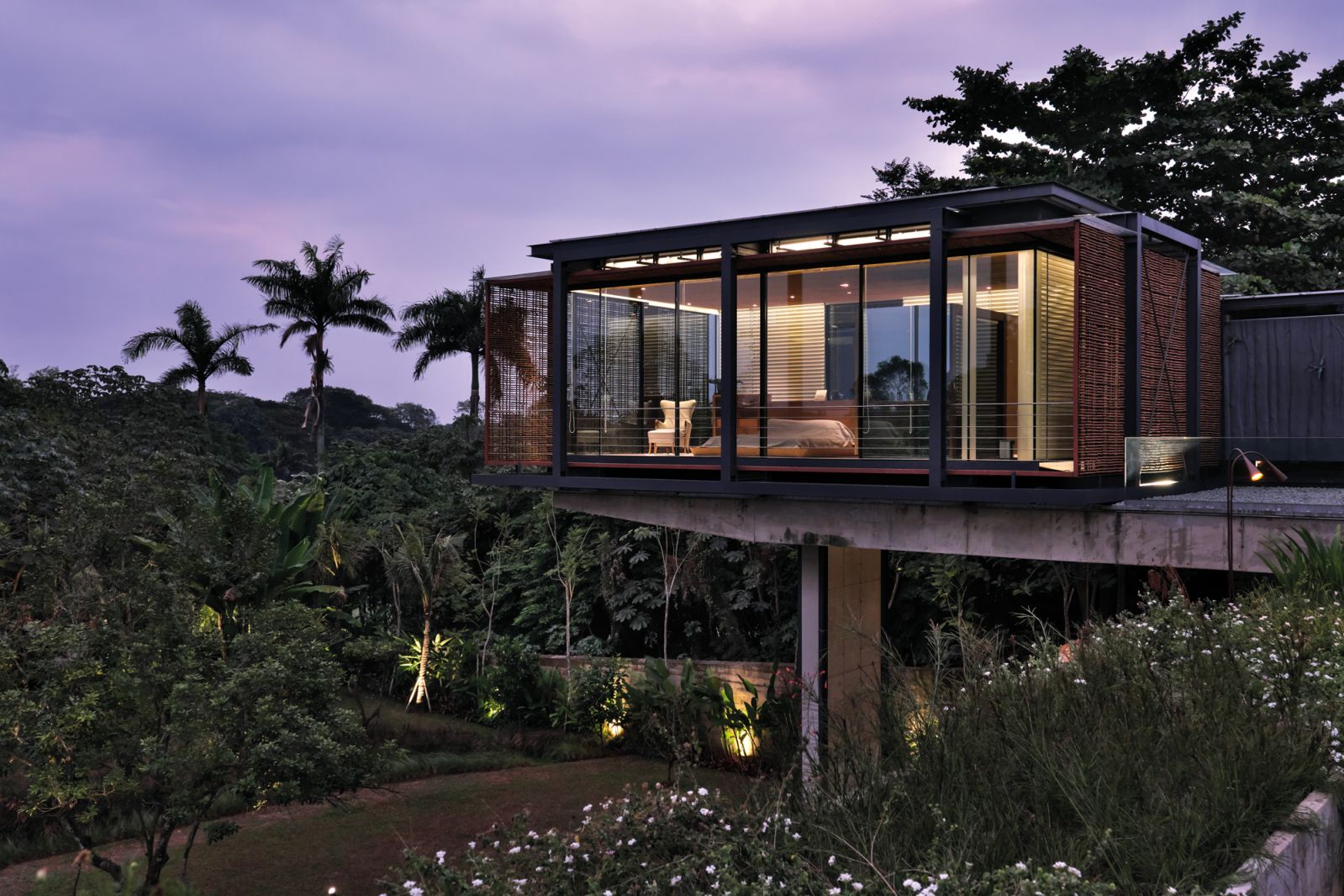 An evening view of the master bedroom from the flowering garden