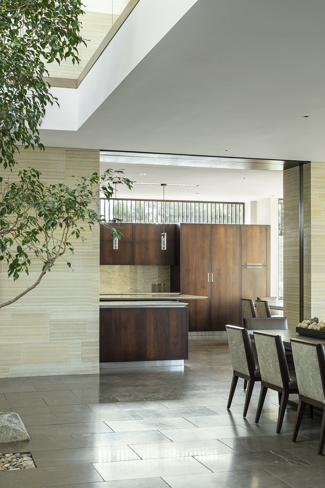 Seamless pathways from the foyer to the dining and kitchen areas
