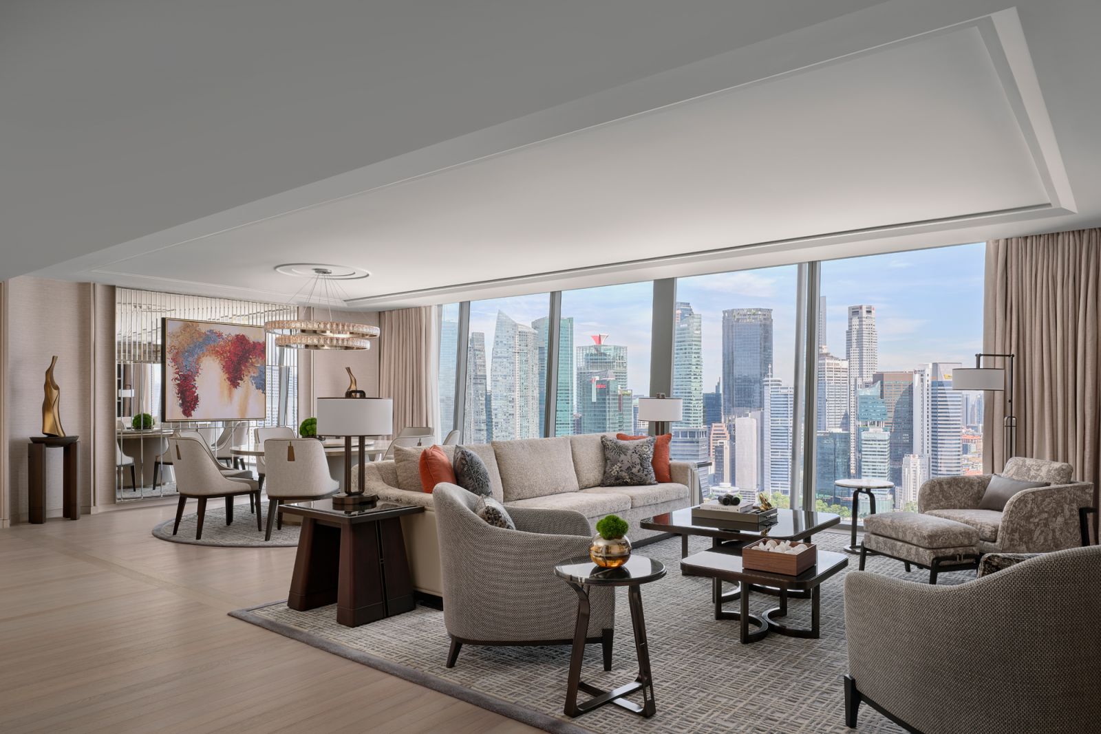 An expansive living and dining area to host intimate parties against Singapore's skyline