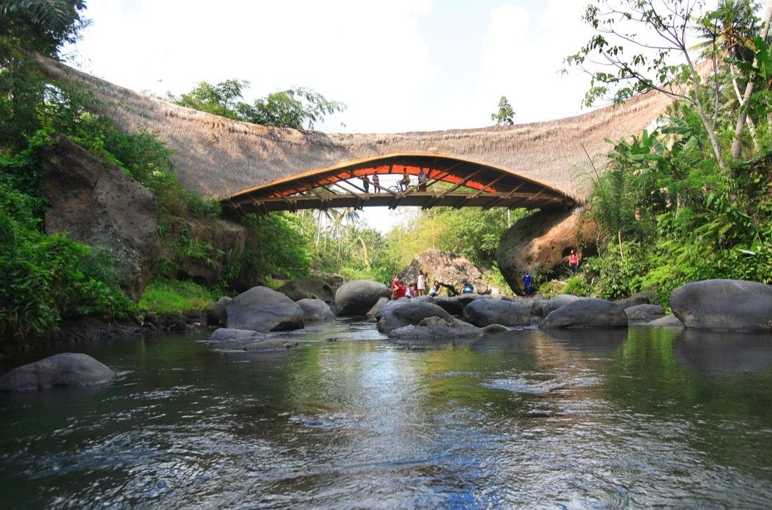 The 23-metre bamboo bridge with a Minangkabau-inspired roof is the largest bamboo bridge in Asia (Photo: Courtesy of PT Bambu)