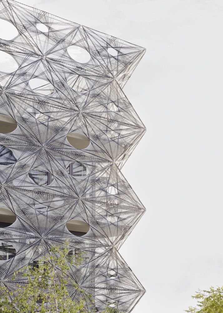 A world’s-first façade comprising woven carbon and glass fibre tiles (Photo: Brigida González / Courtesy of allmannwappner)