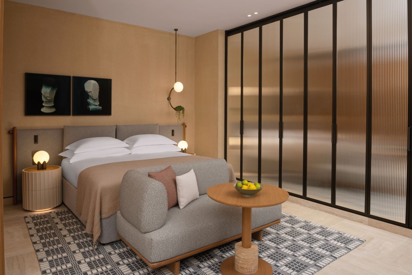 This room at Six Senses Rome features plush furniture and artworks by emerging artists