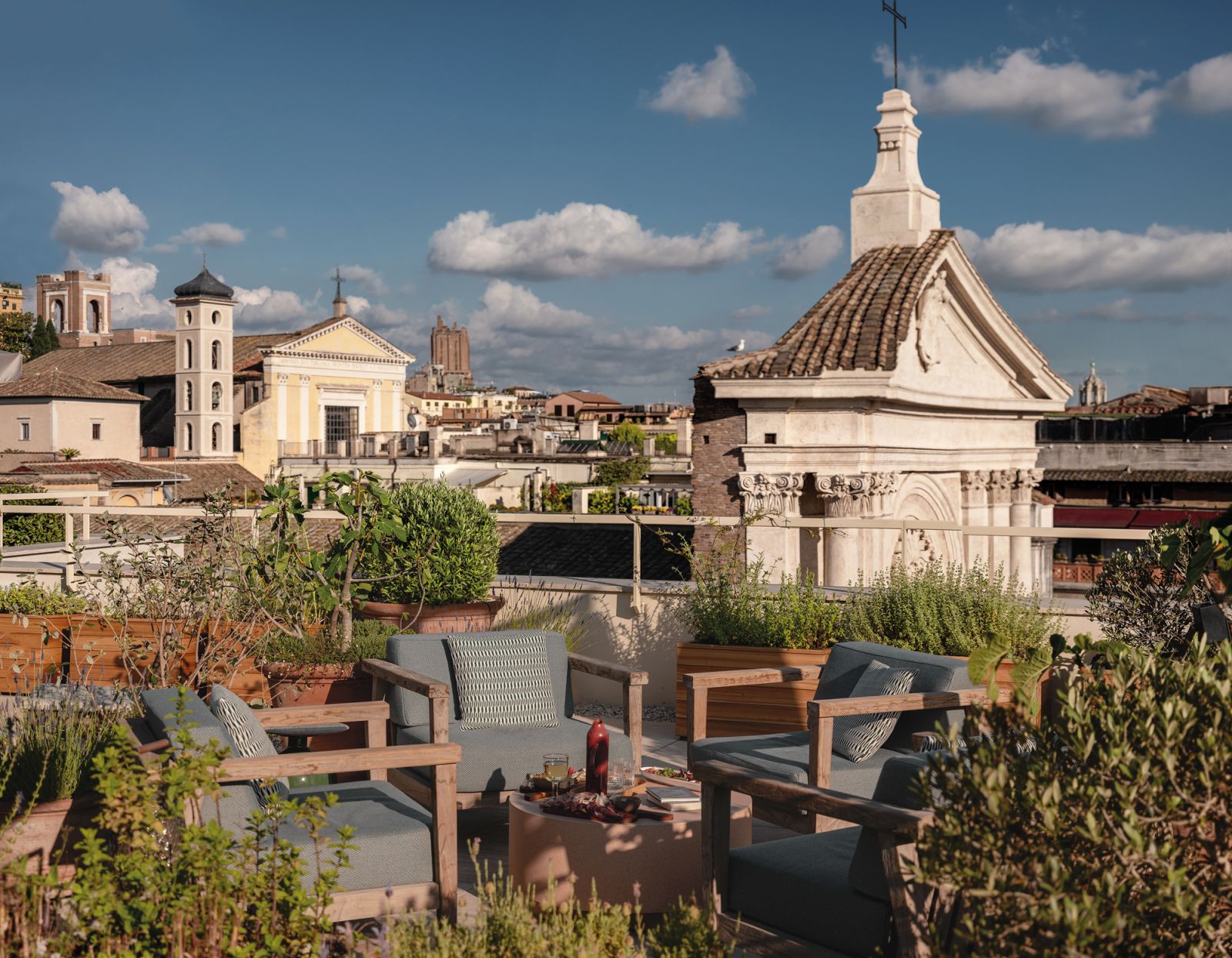Its enchanting rooftop bar boasts sweeping vistas of the cityscape
