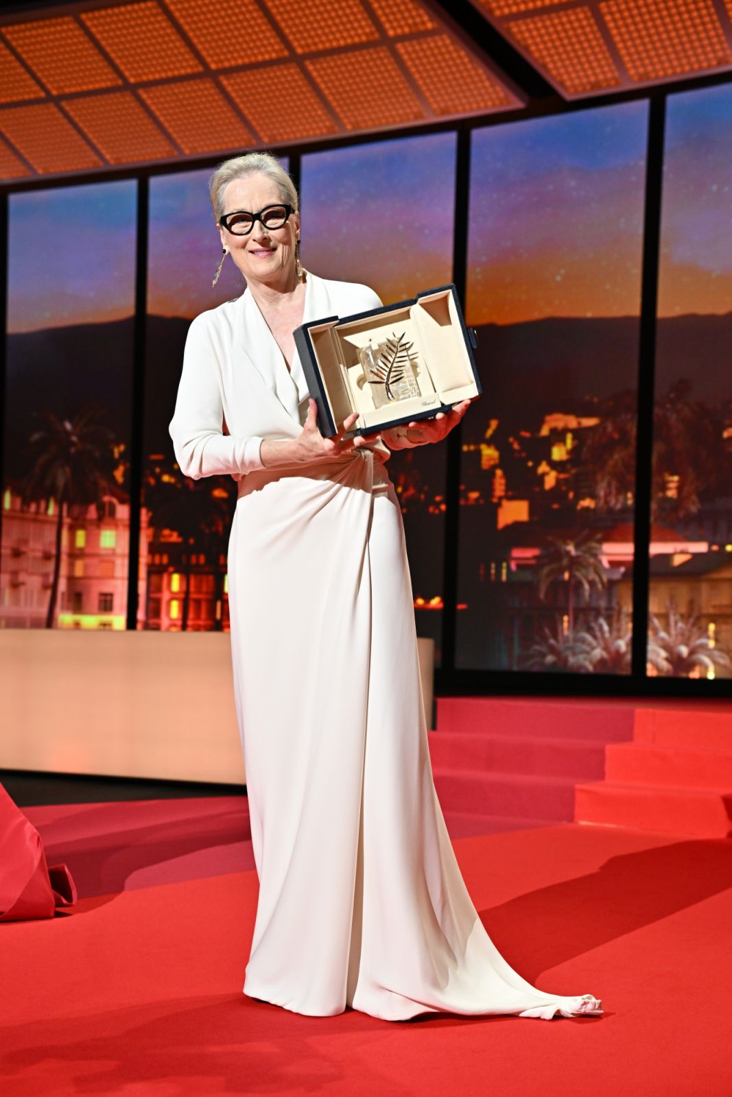 CANNES, FRANCE - MAY 14: Meryl Streep receives the Honorary Palme DâOr Award on stage during the opening ceremony at the 77th annual Cannes Film Festival at Palais des Festivals on May 14, 2024 in Cannes, France. (Photo by Stephane Cardinale - Corbis/Corbis via Getty Images)