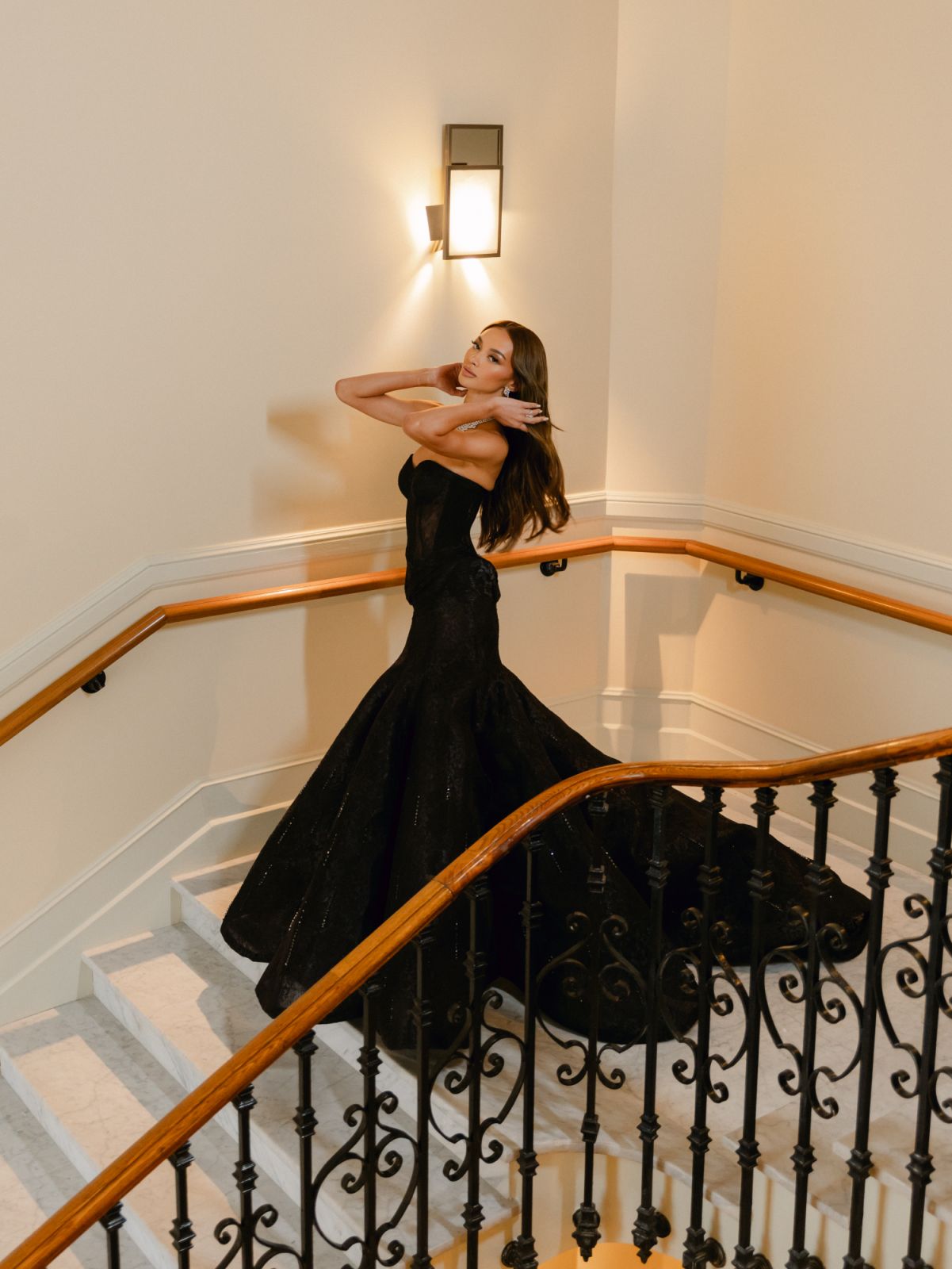 Kylie Versoza wears a custom black Chantilly lace Mark Bumgarner gown (Photo: Juan Padilla)