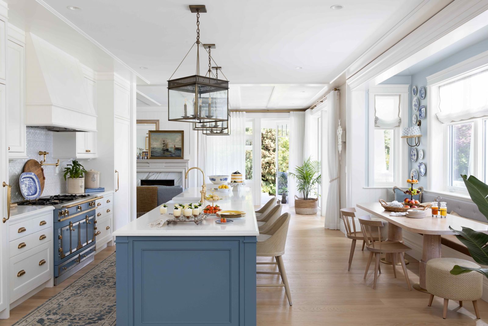 A provincial blue island anchors the main kitchen
