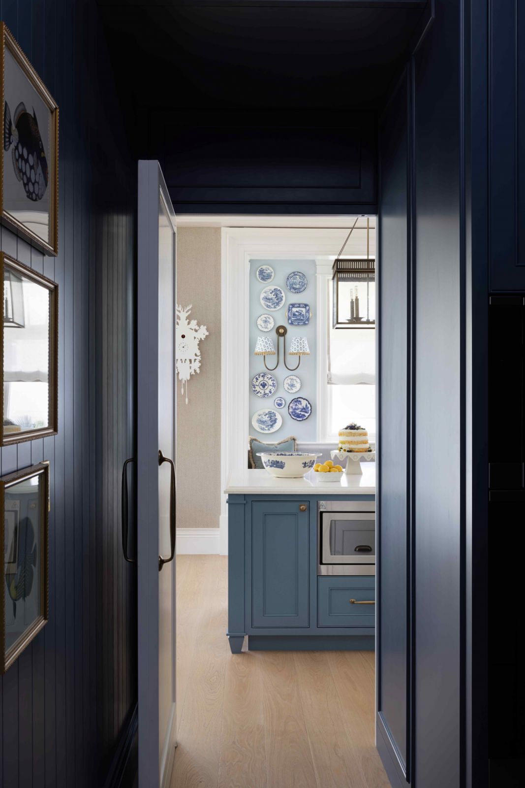Blue cabinetry in the butler's pantry