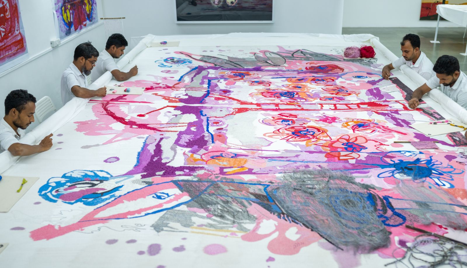 Chanakya artisans at work transforming paintings into textile (Photo: courtesy of Chanakya foundation)