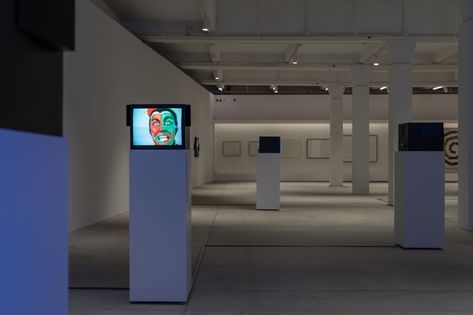 Installation view of Nauman's "Clown Torture" at Tai Kwun (Photo: courtesy Tai Kwun Contemporary, © 2024 Bruce Nauman / Artists Rights Society (ARS))