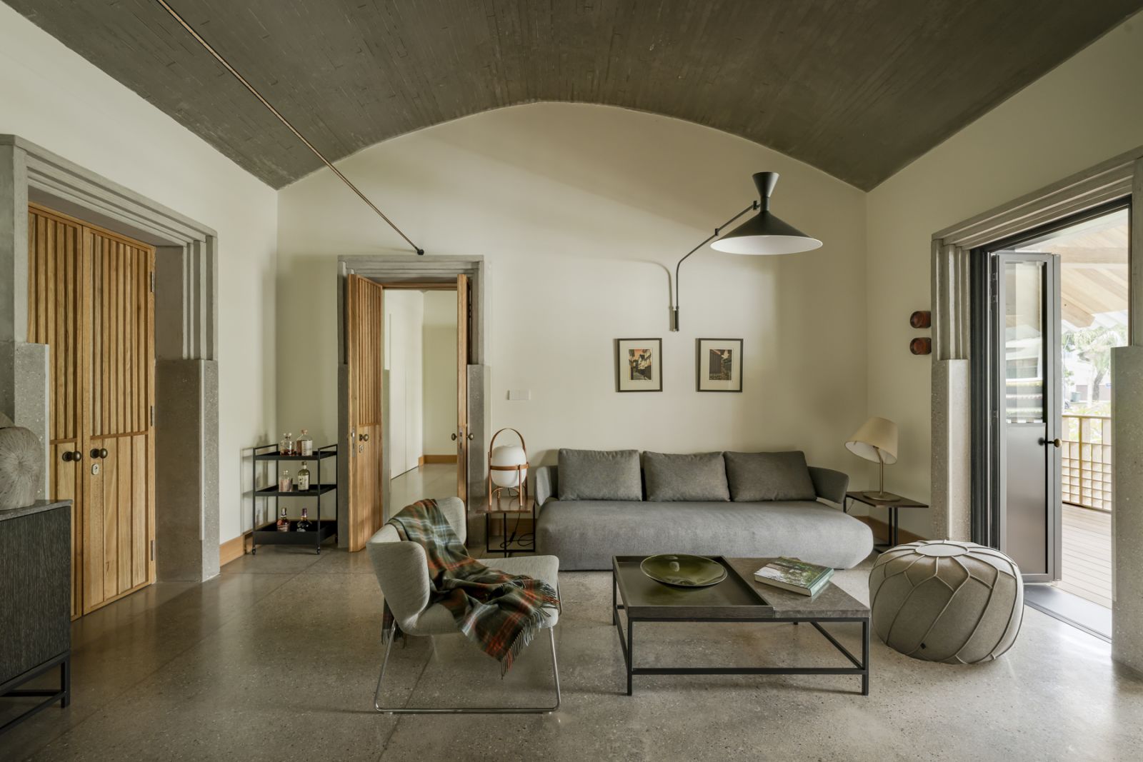 The curved ceilings add a cozier sense of scale to the living area
