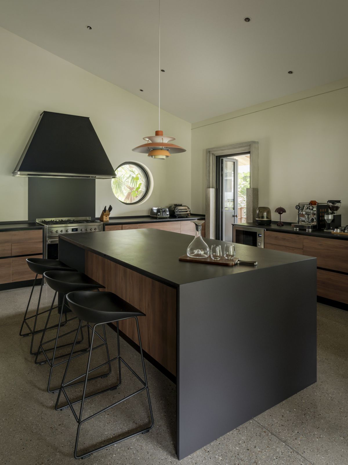 Simple black and wood finishes were used in the kitchen