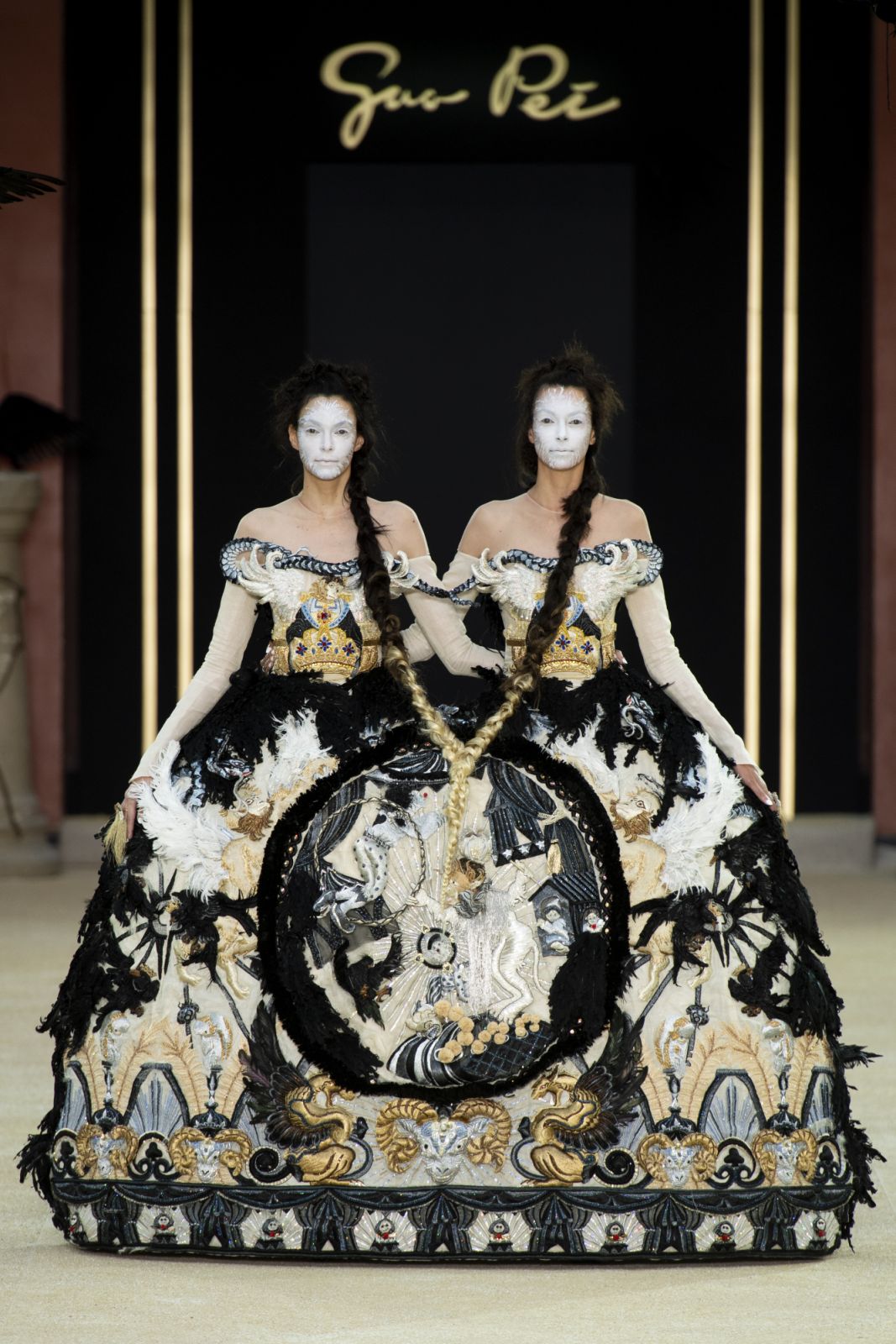 Models on the catwalk (Photo by Dominique MaÃ®tre/WWD/Penske Media via Getty Images)