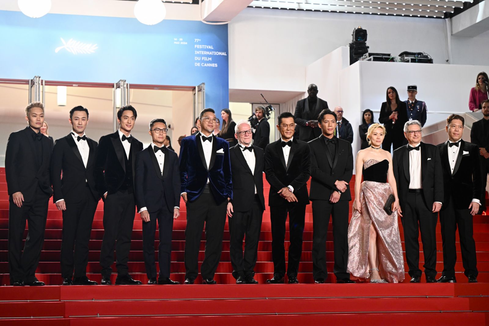 CANNES, FRANCE - MAY 16: (L-R) Tony Wu, Raymond Lam, Terrance Lau, Chai-Tuck Yip, Soi Cheang, Louis Koo, German Cheung, Kinnie Cheung, Victor Hadida and Angus Chan attend the "Twilight Of The Warriors: Walled In" (City Of Darkness) Red Carpet at the 77th annual Cannes Film Festival at Palais des Festivals on May 16, 2024 in Cannes, France. (Photo by Stephane Cardinale - Corbis/Corbis via Getty Images)