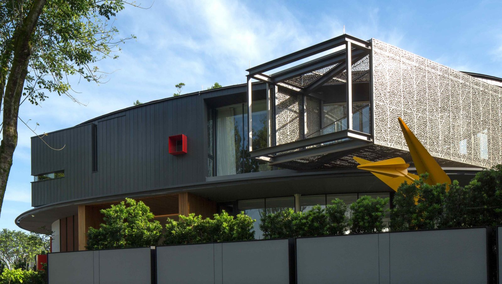 House with a Sanctum by René Tan, featuring a laser cut steel veil façade
