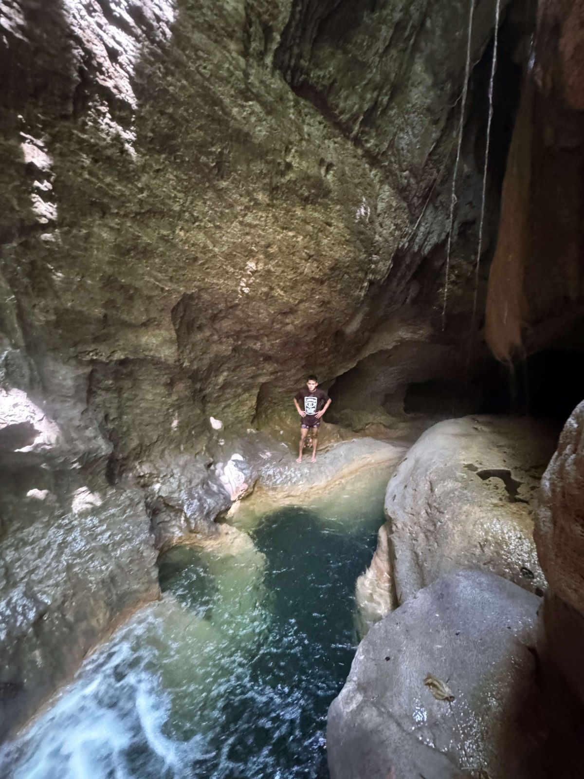 Our guide admist one of the caverns at the Jovellar river | Photo by: Adi Bontuyan
