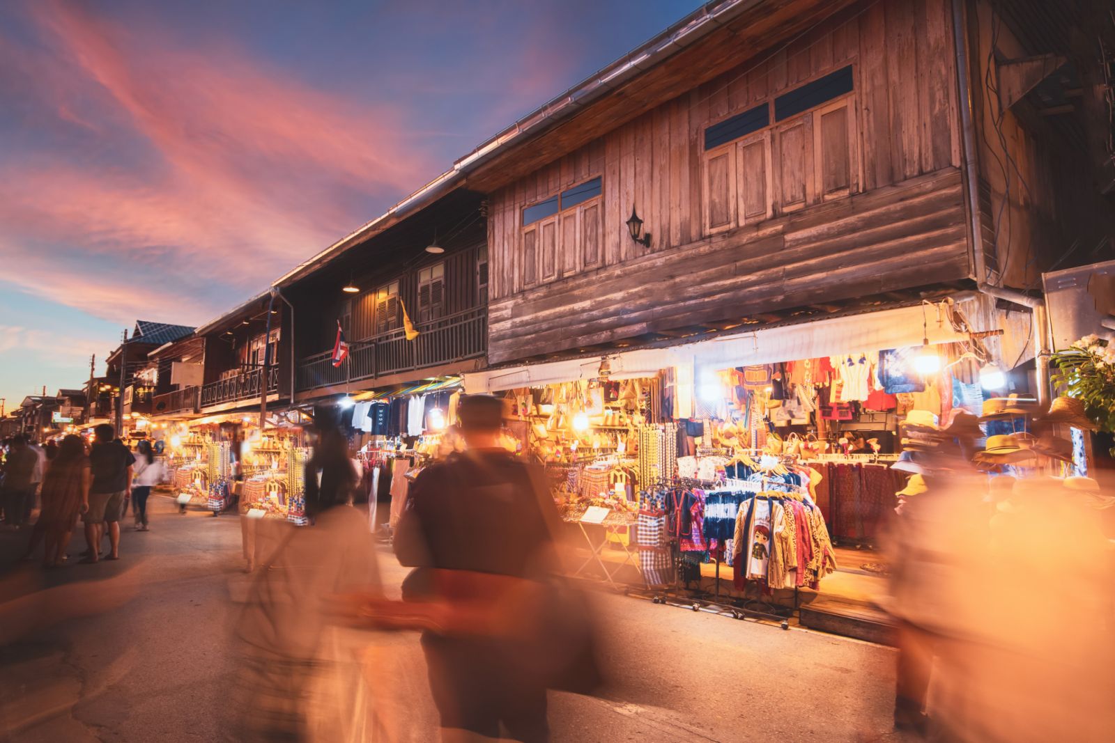 LoeiChiang Khan walking street and night market,Thailand people in street market at twilight with bokeh , Chinag Khan , Thailand.