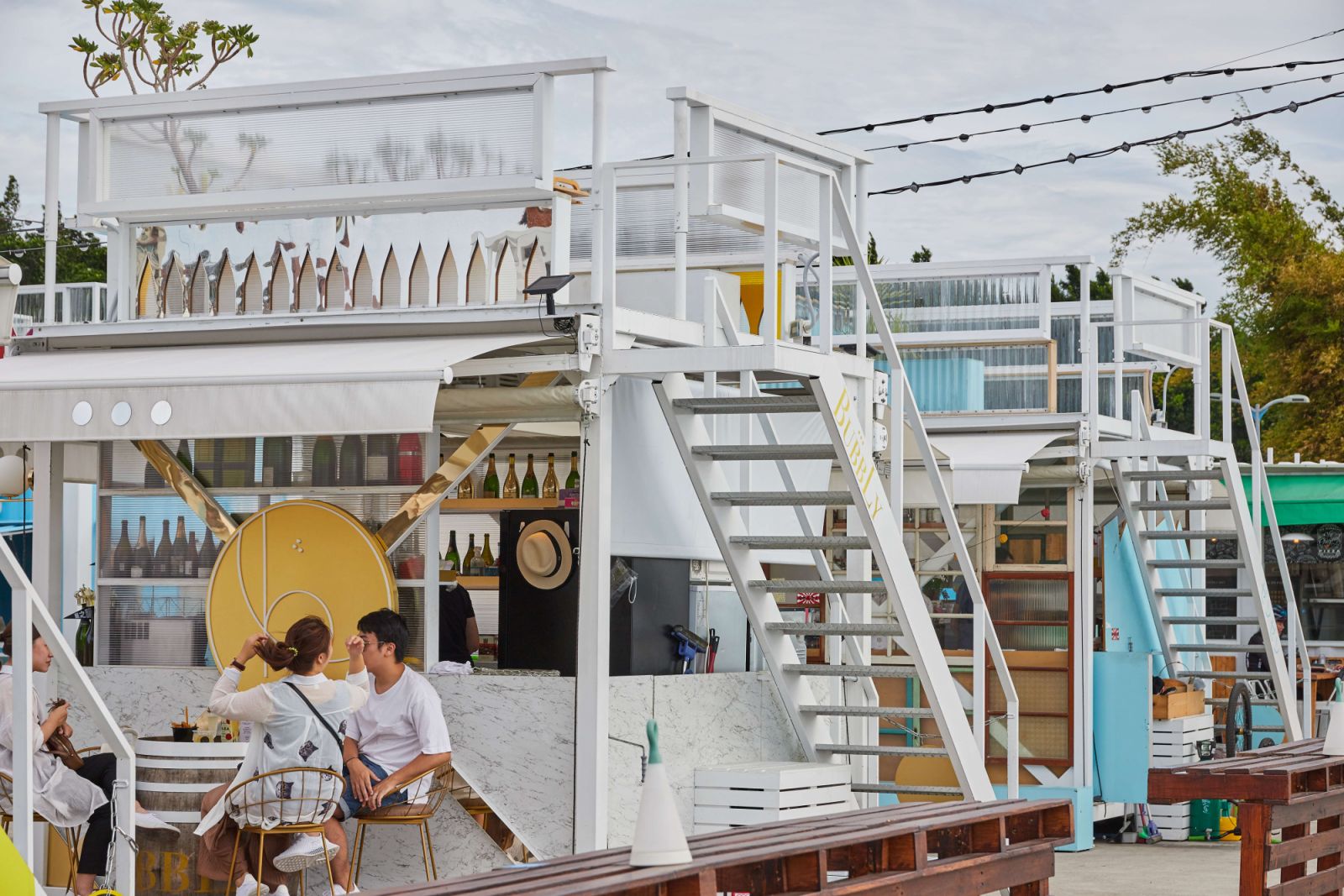 PIER 5, TAIPEI, TAIWAN - 2018/07/04: Pier 5 is a new food and drink site next to the Dadaocheng Wharf. Housed in shipping containers, the colorful location makes for a relaxing afternoon eating and drinking by the river. (Photo by Craig Ferguson/LightRocket via Getty Images)