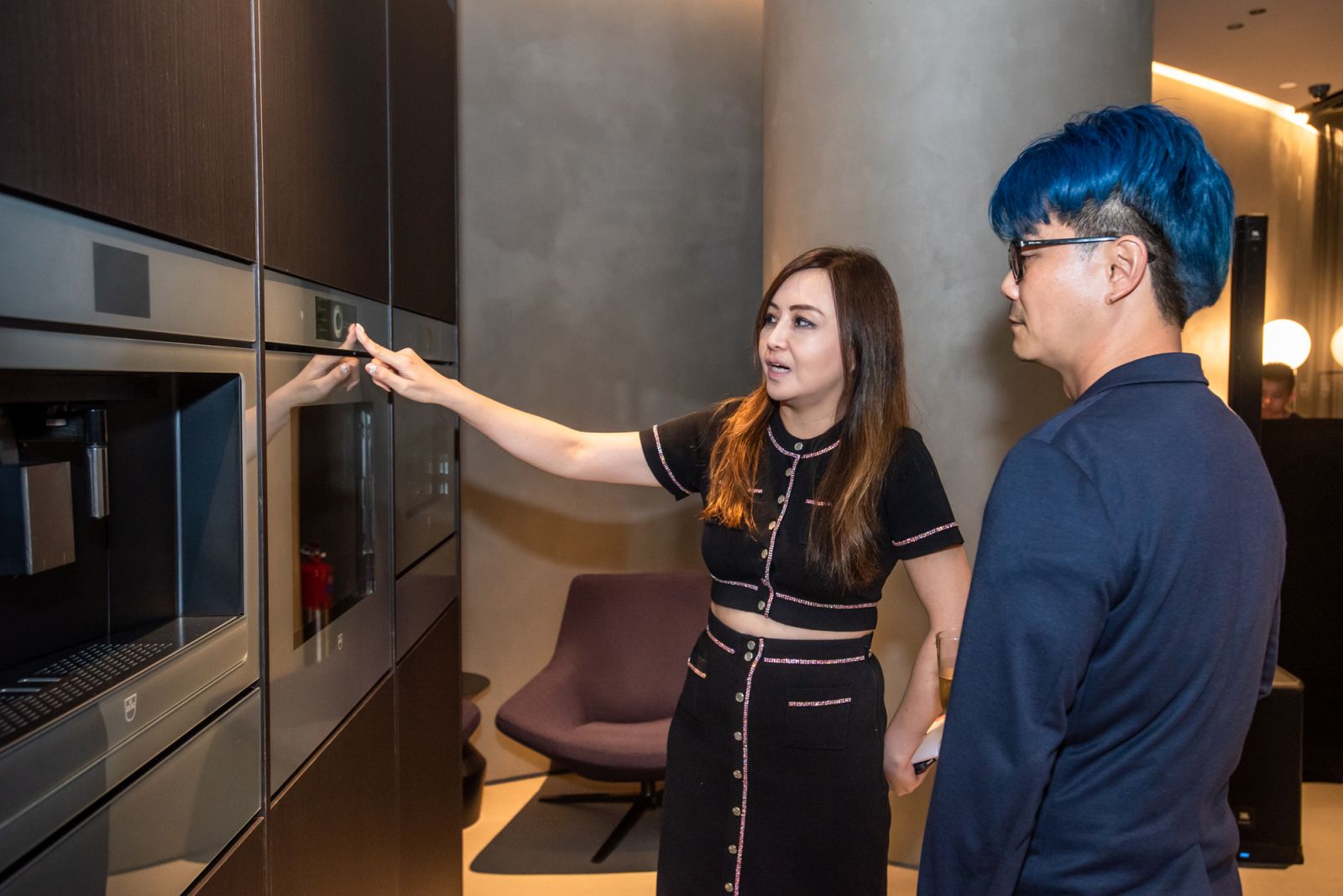 V-Zug's managing director for Southeast Asia, Angeline Yap, showcasing the V-Zug cooking appliances to XXX