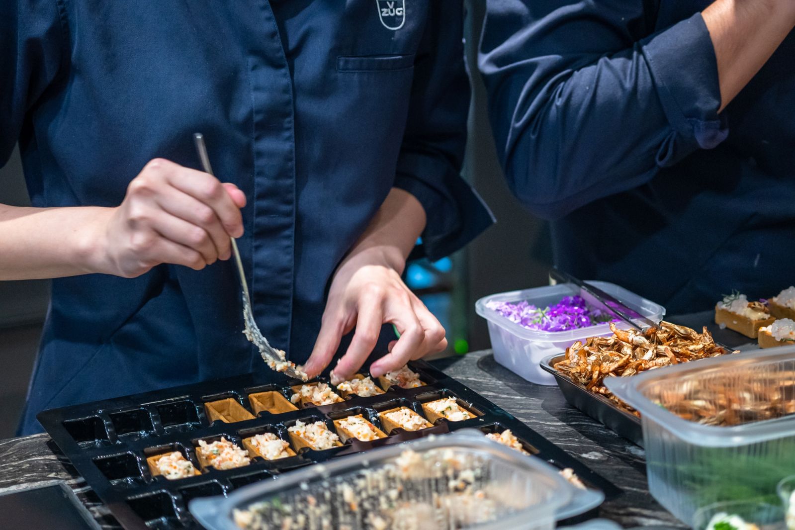 The chef's team assembling the canapes for the evening